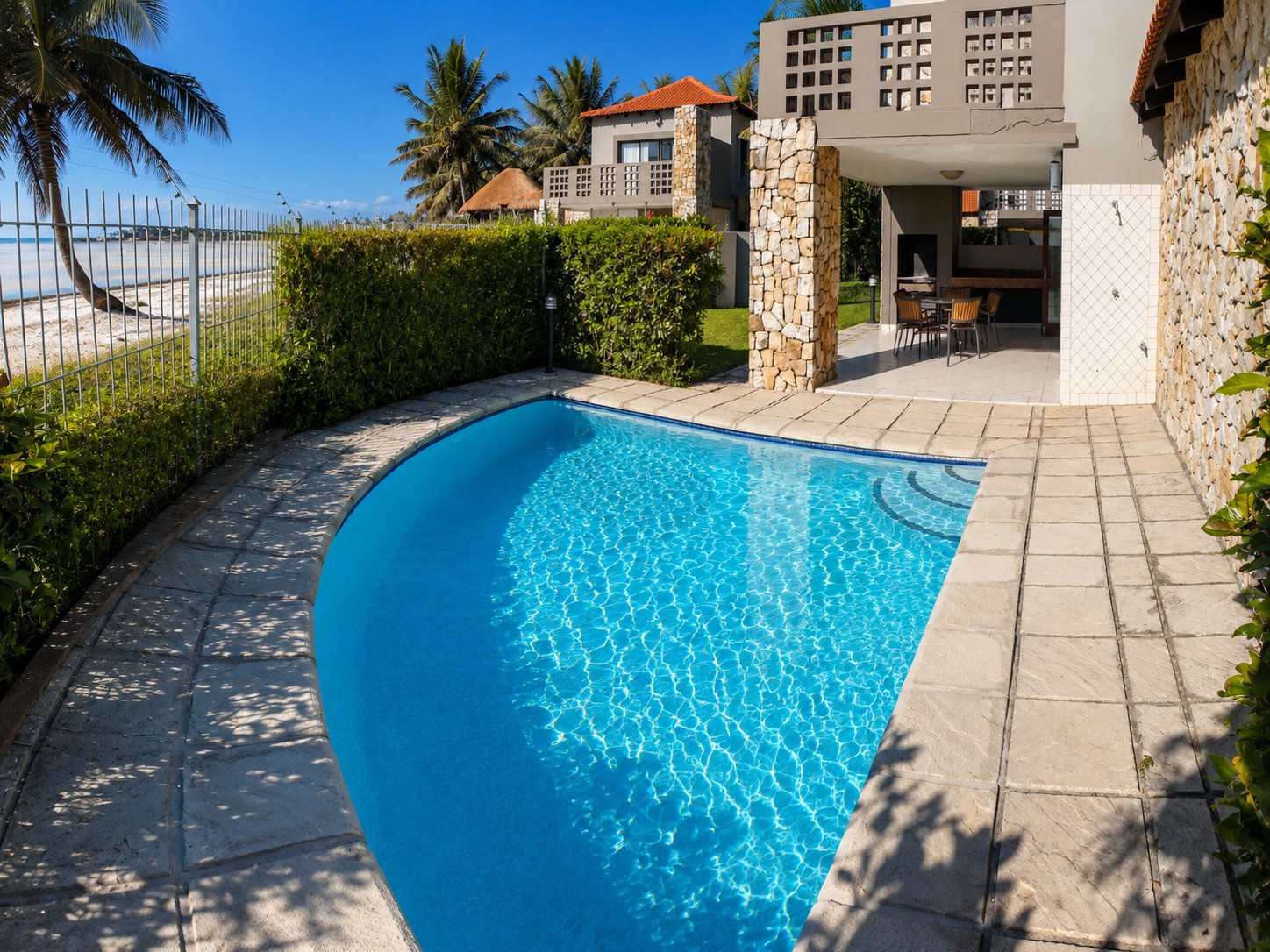 Private pool with beach access fence