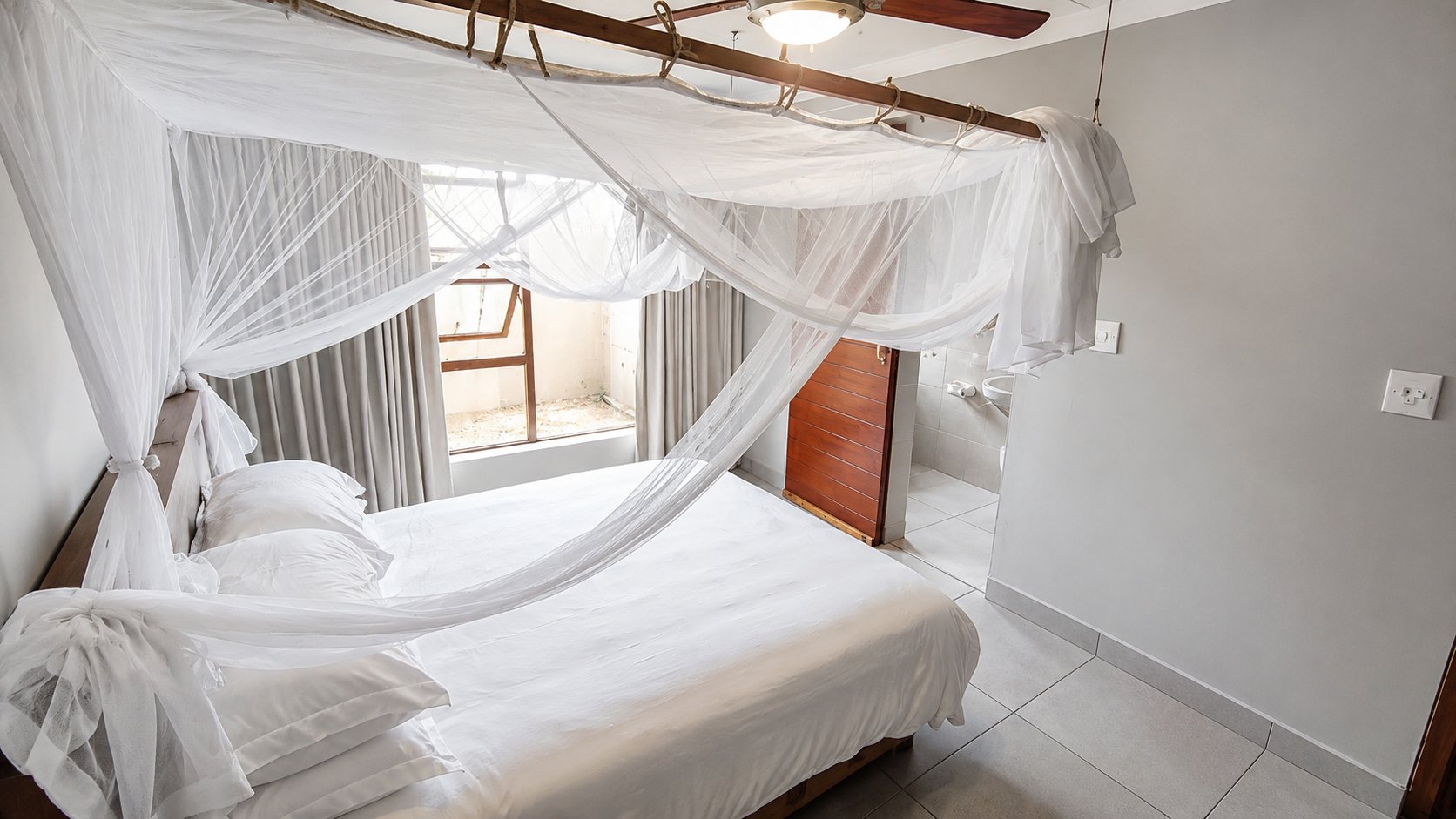Bedroom with canopy mosquito net
