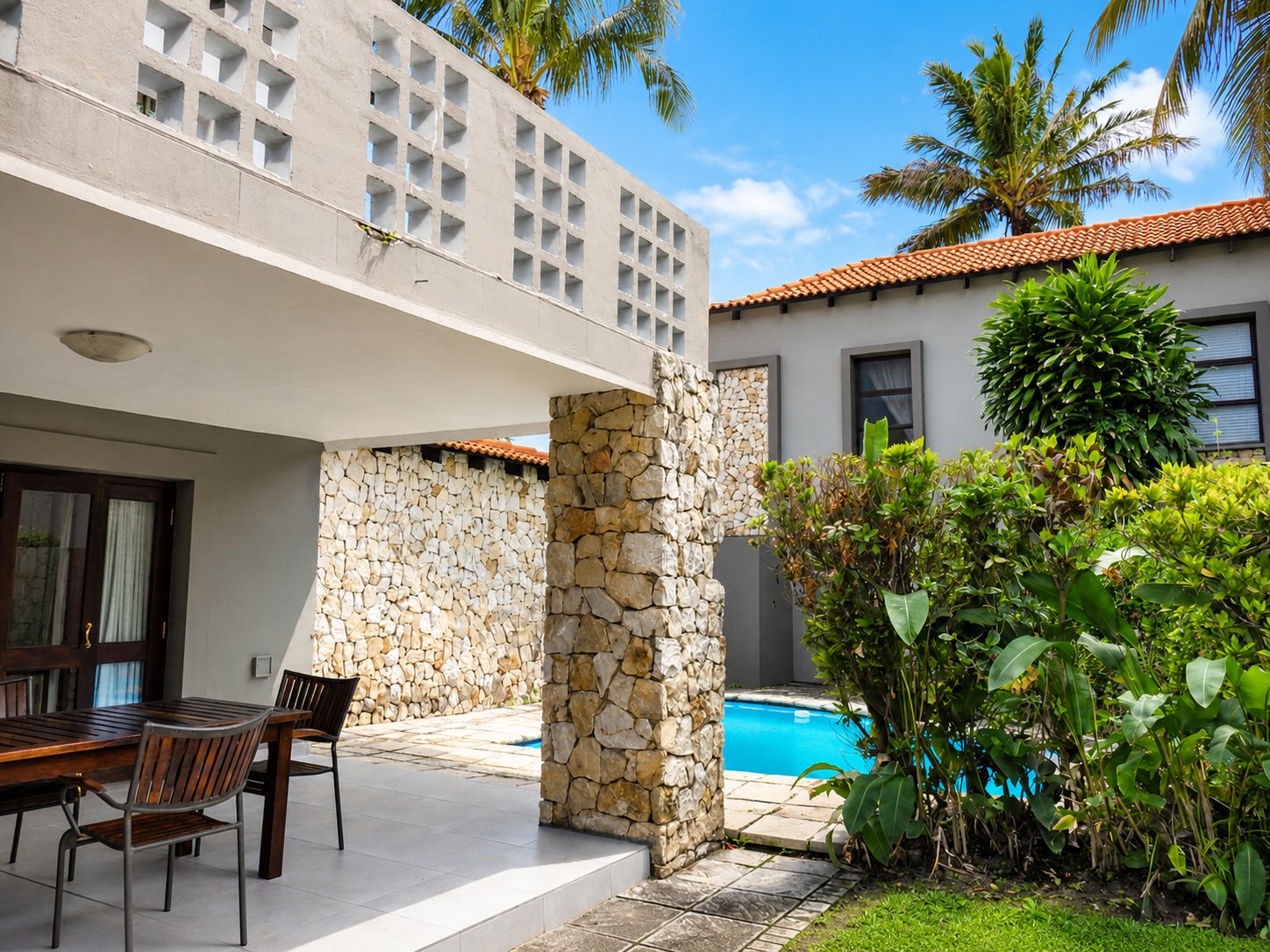 Courtyard walkway beside the private pool