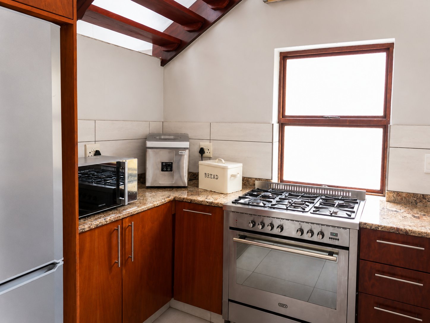 Kitchen countertop with kettle and bread bin