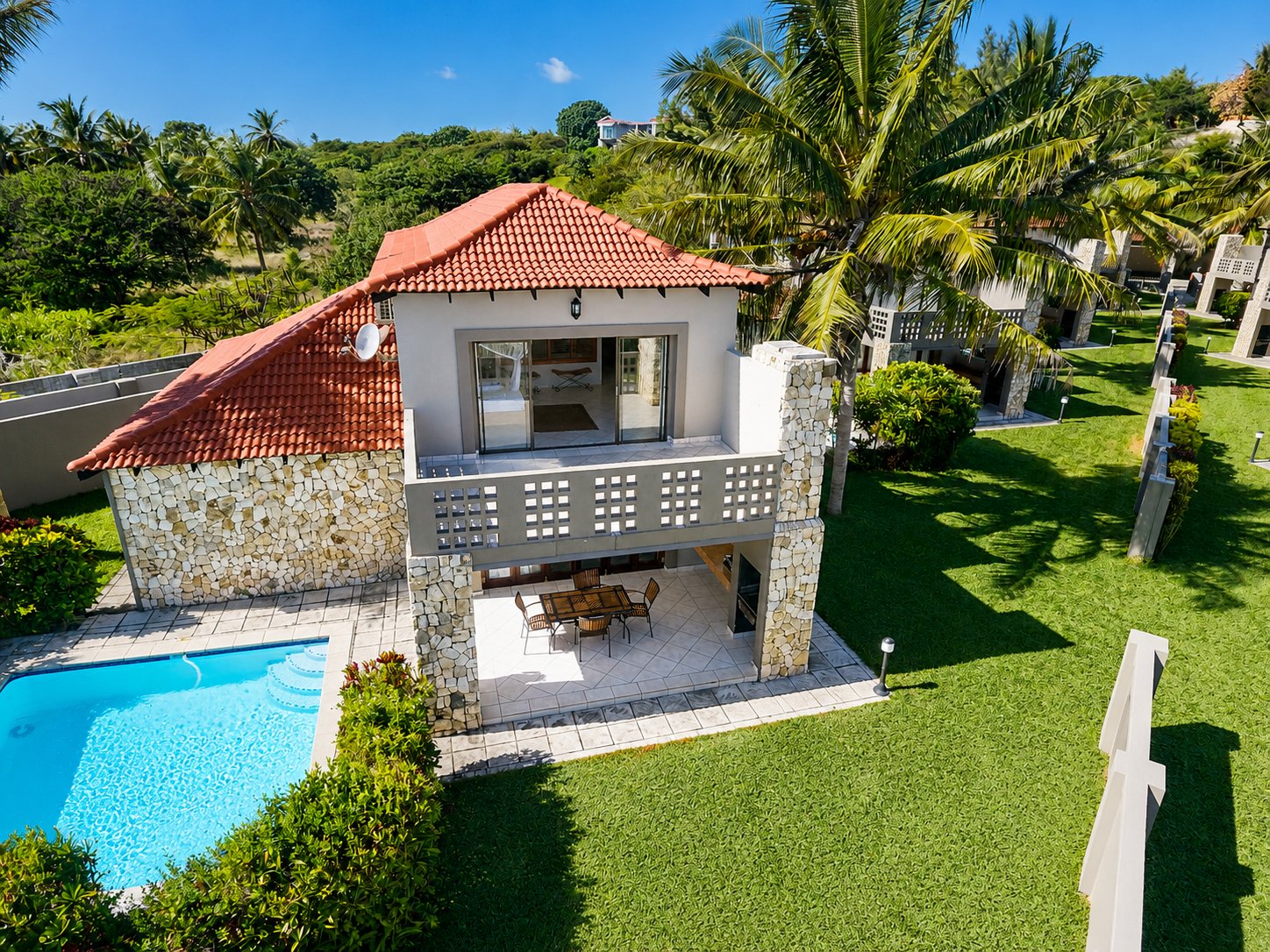 Aerial view of the unit and private pool