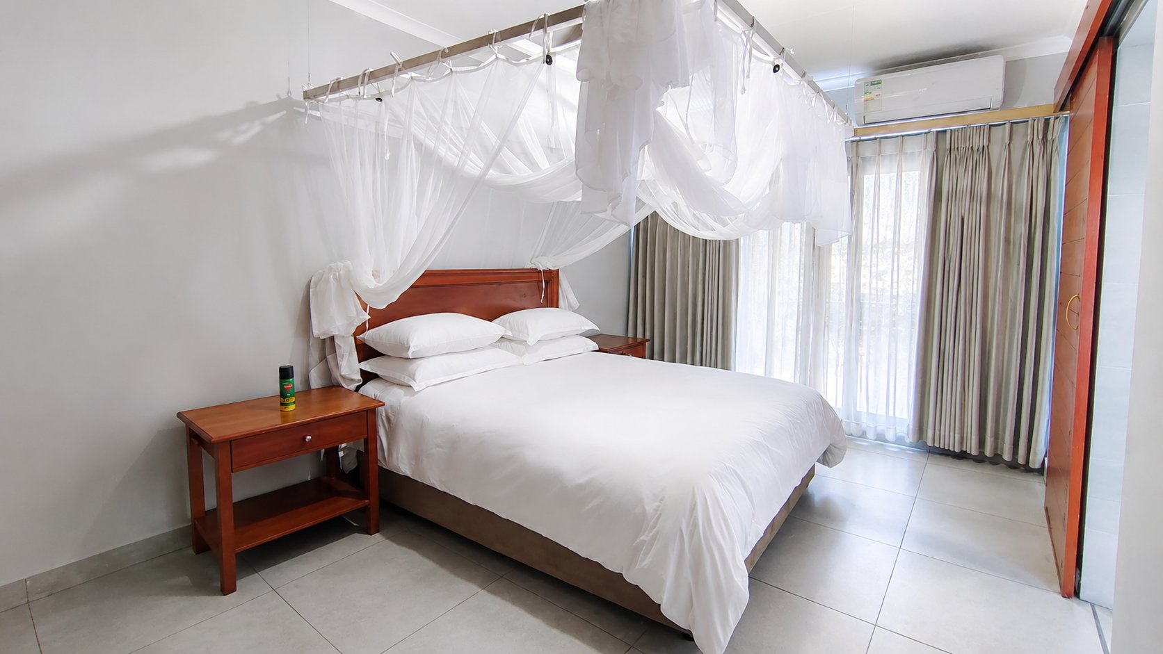 Bedroom with air conditioning and en-suite access
