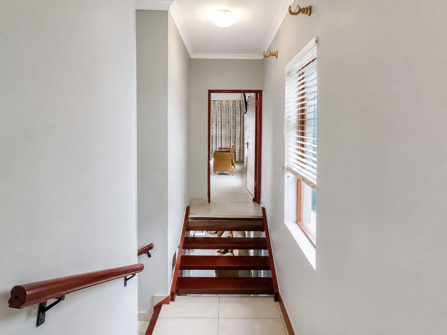 Staircase leading to the upper-level bedrooms