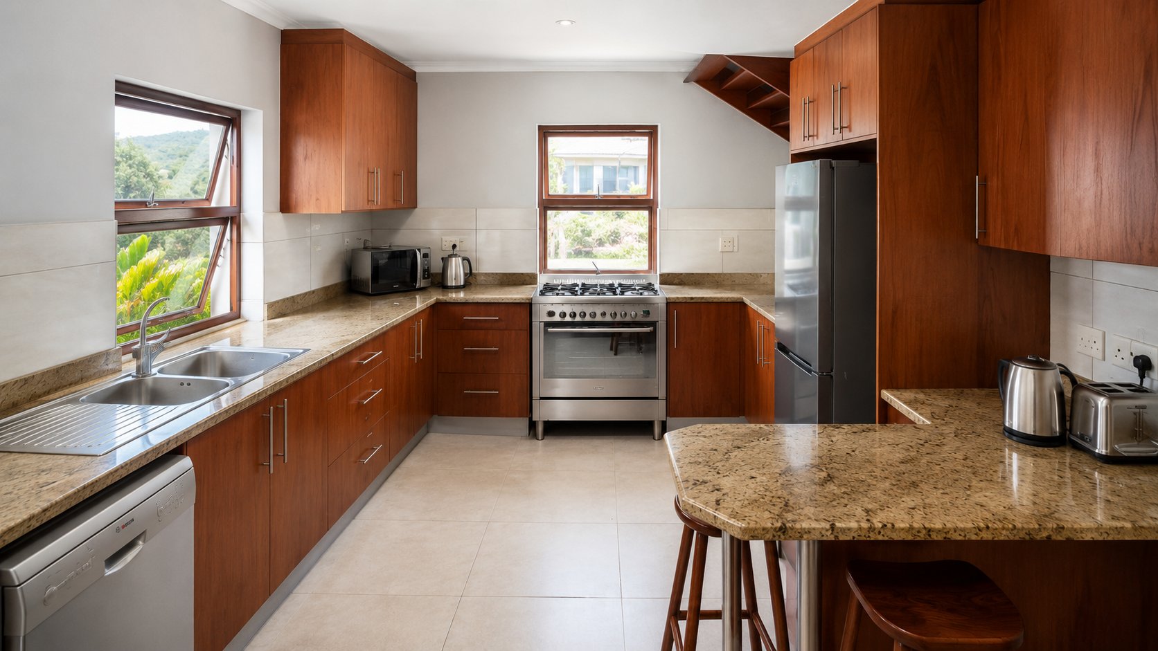 Fully equipped kitchen with gas stove and granite countertops