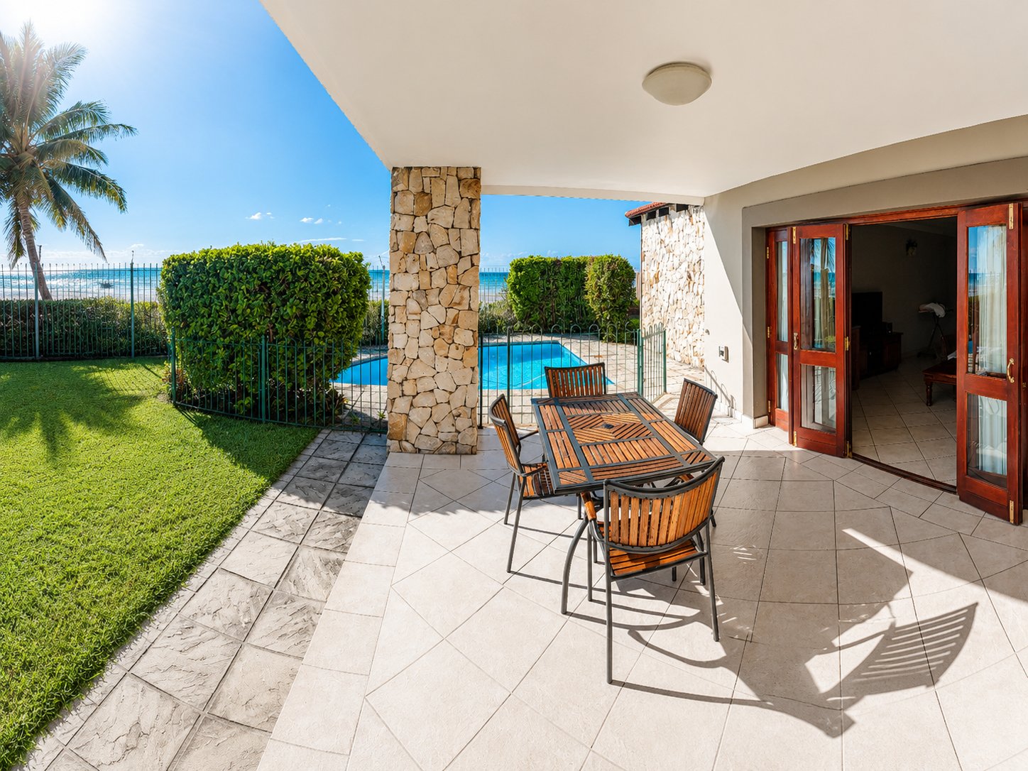 Private pool with garden and beach fence