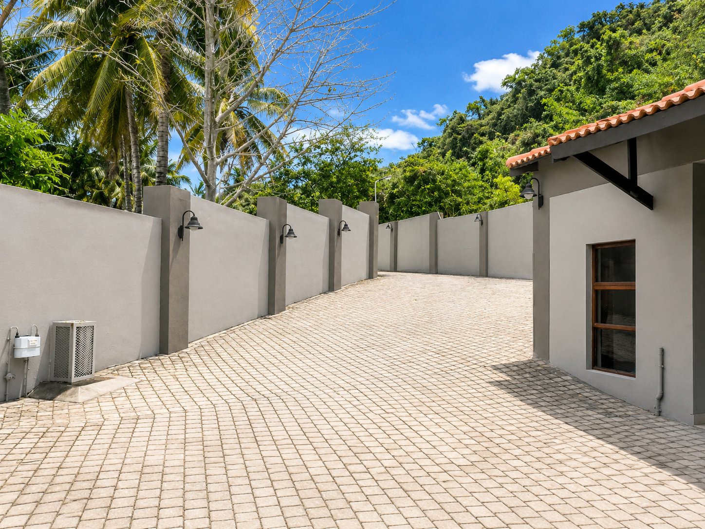 Paved driveway leading to the units
